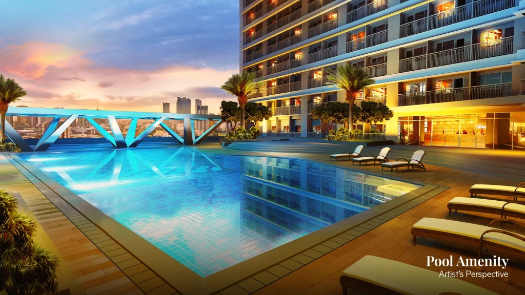 Fame-Residences-Pool-1-Night.webp